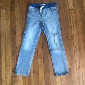 Old Navy boys jeans with holes in front. Never worn.